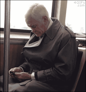Gif of man frustrated with text on his phone 